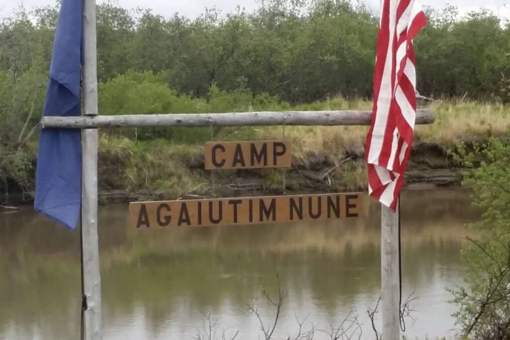 Wooden sign of Camp Agaiutim Nune